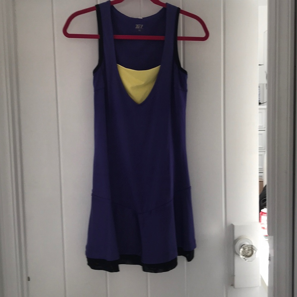 Purple tennis dress with yellow v neck lining